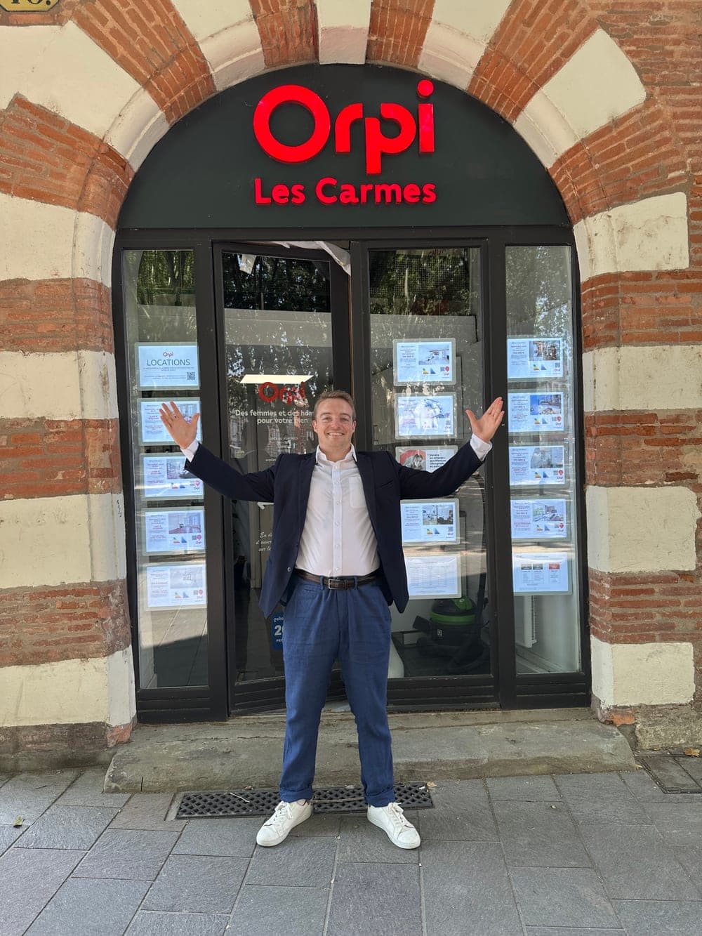 John Newman Prentice outside the Orpi Les Carmes agency in Toulouse